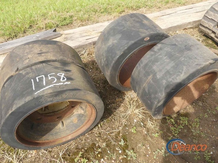 set-of-(4)-press-on-forklift-wheels-and-tires-image-1
