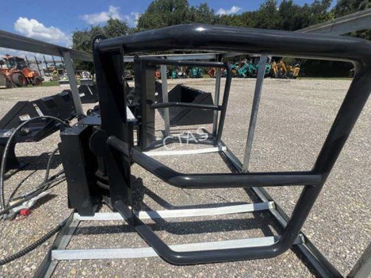 #9-•-wolverine-skid-steer-hydraulic-hay-bale-mover-image-2