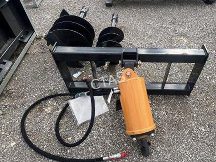 #152-•-wolverine-skid-steer-auger-w/-12"-&-18"-bits-image-1