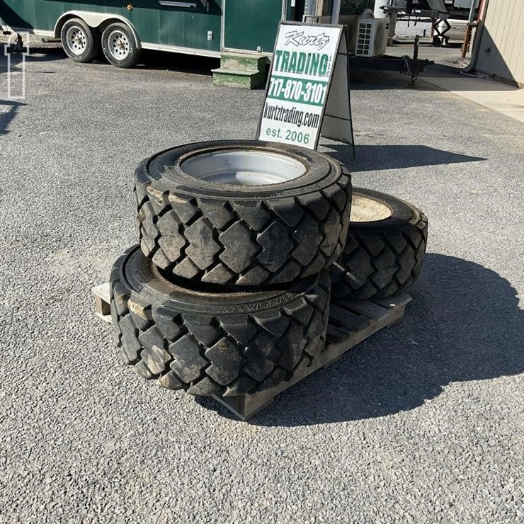 (3) SKID STEER 12X16.5 WHEELS & TIRES
