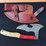 custom-damascus-steel-fixed-blade-knife-w/-cream/red/blue-striped-handle-image-2