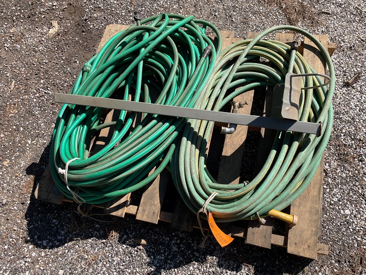 #1671-•-pallet-of-garden-hoses-image-1