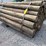 qty-(35)-unused-6-7"x8'-tapered-pressure-treated-posts-image-1