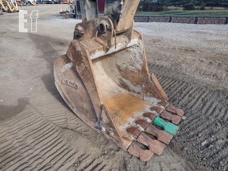 2010-deere-120d-image-16
