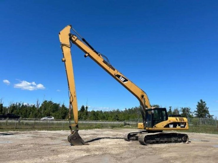 2010-caterpillar-324dl-image-1