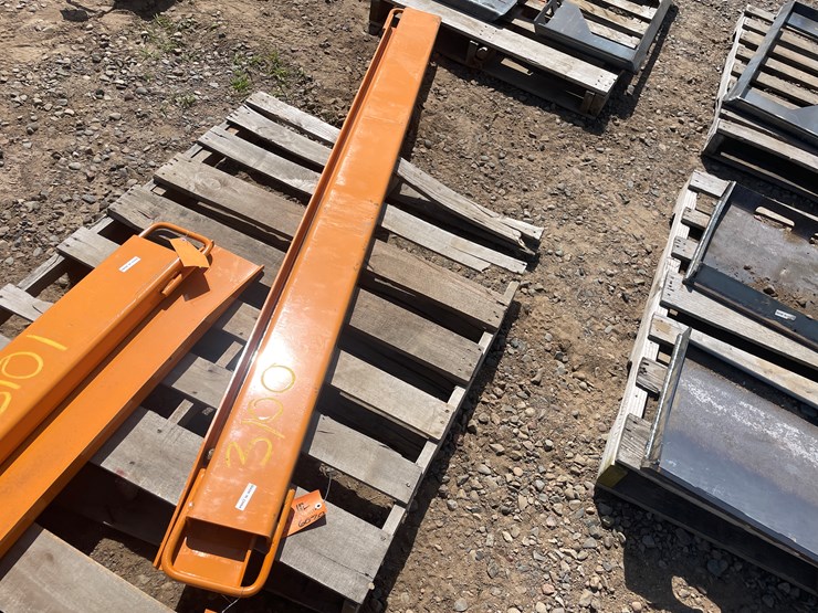 #3100-•-unused-2025-wolverine-skid-steer-pallet-fork-extensions-image-1