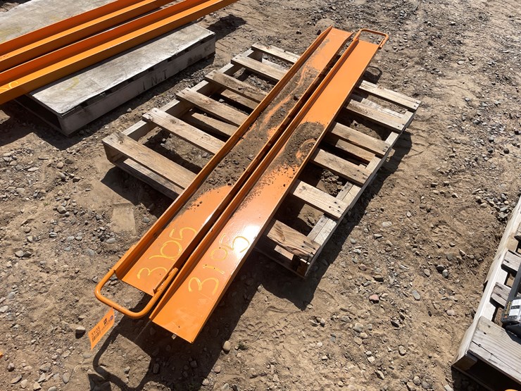#3105-•-unused-2025-wolverine-skid-steer-pallet-fork-extensions-image-3