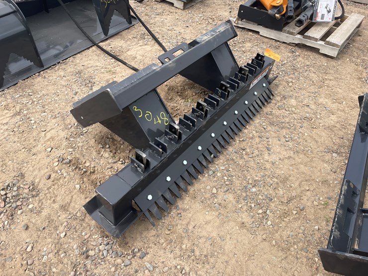 #3048-•-unused-2025-wolverine-skid-steer-ripper-attachment-image-1