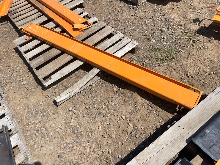 #3100-•-unused-2025-wolverine-skid-steer-pallet-fork-extensions-image-2