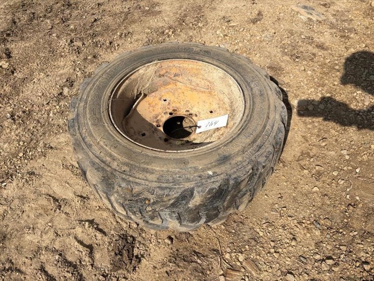 (1)-10-16.5-skidsteer-tire-w/rim-image-2