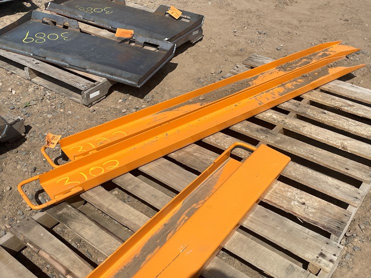 #3102-•-unused-2025-wolverine-skid-steer-pallet-fork-extensions-image-1