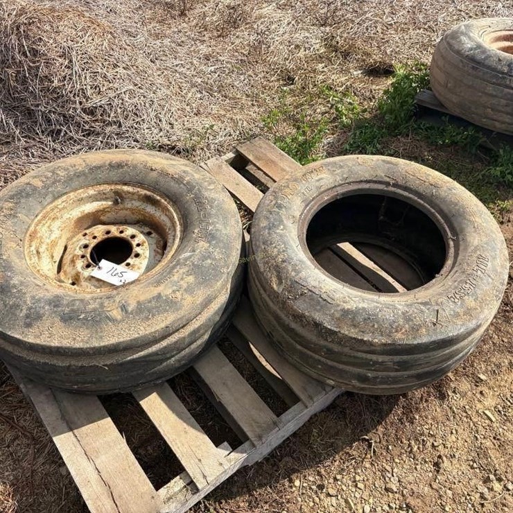 (2) 11L - 15SL Tires. 1 with a Rim