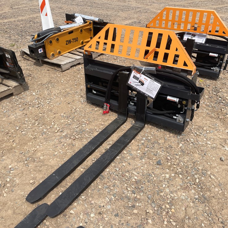 #3064 • Unused 2025 Wolverine Hydraulic Adjustable Pallet Fork Attachment
