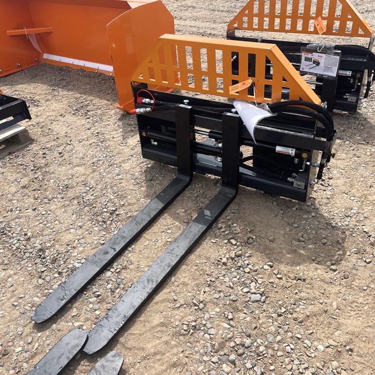 #3065 • Unused 2025 Wolverine Hydraulic Adjustable Pallet Fork Attachment