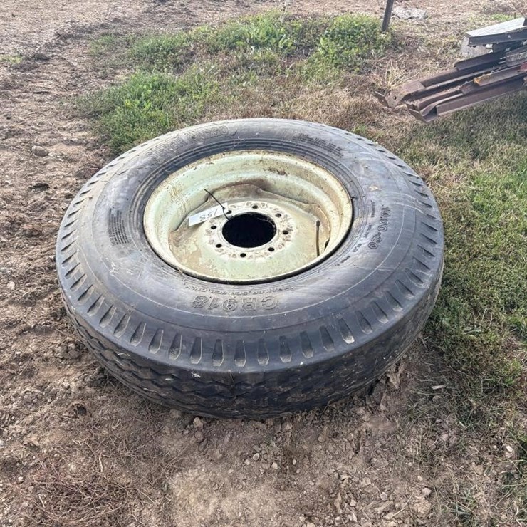 (1) 10.00 - 20 Tire w/rim