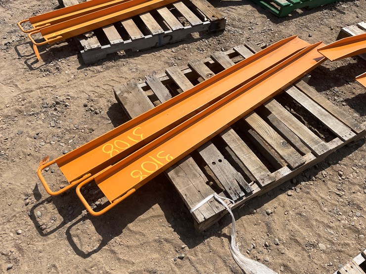 #3108-•-unused-2025-wolverine-skid-steer-pallet-fork-extensions-image-1