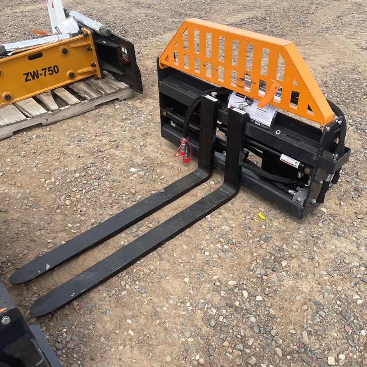 #3063 • Unused 2025 Wolverine Hydraulic Adjustable Pallet Fork Attachment