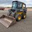 2012-deere-320d-image-1