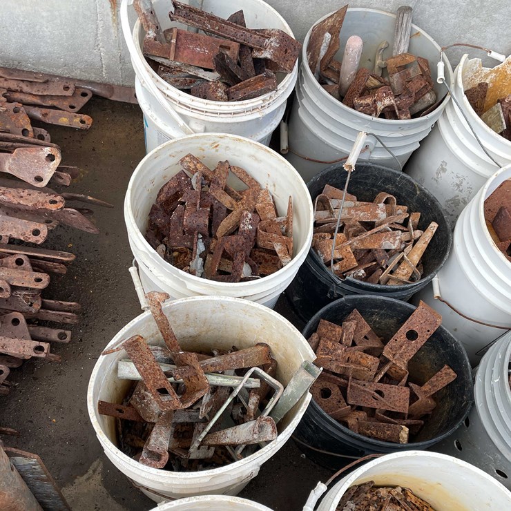 #1338 • (8) Buckets of Concrete Form Parts