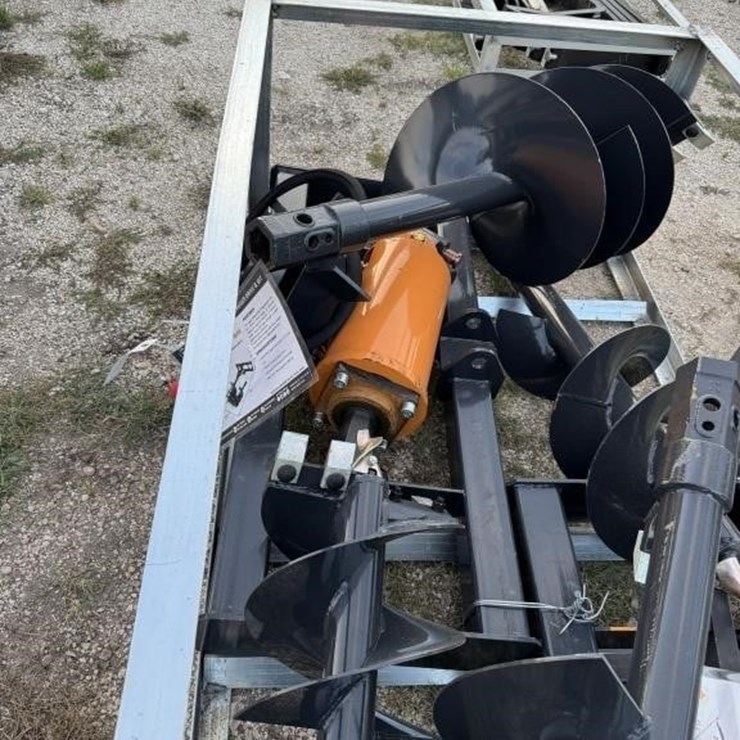 1- Wolverine, GB-11-72W, Skid steer auger. Comes