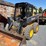 2012-deere-320d-image-1