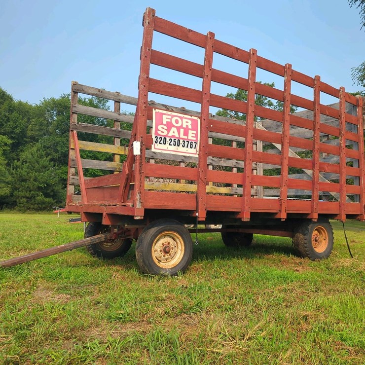 Knowles Kicker Hay Rack, 16 ft x 7 ft x 8 ft, 5-6 ton capacity, Wood and Metal, 15-inch tires.