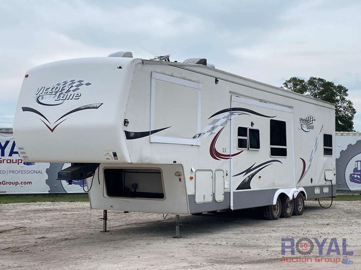 2006-victory-lane-36srv-39ft-tri-axle-5th-wheel-toy-hauler-travel-trailer-image-1