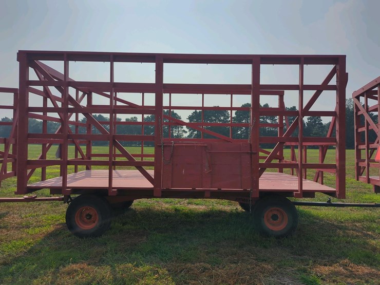 18-ft-wooden-bale-kicker-rack-on-jumbo-10-ton-wagon-(stored-inside)-image-1