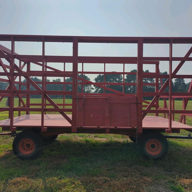 18 ft Wooden Bale Kicker rack on Jumbo 10 ton wagon (Stored inside)