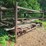 outdoor-metal-storage-rack,-3-shelves-with-assorted-lumber-&-stakes,-pipe-image-2