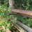 17'-x-6'-x-5'-outdoor-pipe-storage-rack-with-3-shelves,-with-assorted-lumber,-stakes,-and-large-26'-x-6"-pipe-(blue-metal-horses-not-included)-image-3