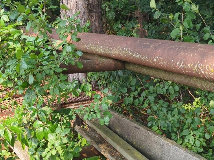 17'-x-6'-x-5'-outdoor-pipe-storage-rack-with-3-shelves,-with-assorted-lumber,-stakes,-and-large-26'-x-6"-pipe-(blue-metal-horses-not-included)-image-3