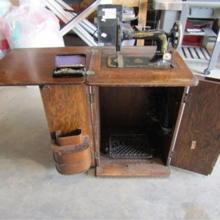 New Home Sewing Machine w/Attachments & Cabinet