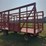 18-ft-wooden-bale-kicker-rack-on-jumbo-10-ton-wagon-(stored-inside)-image-2