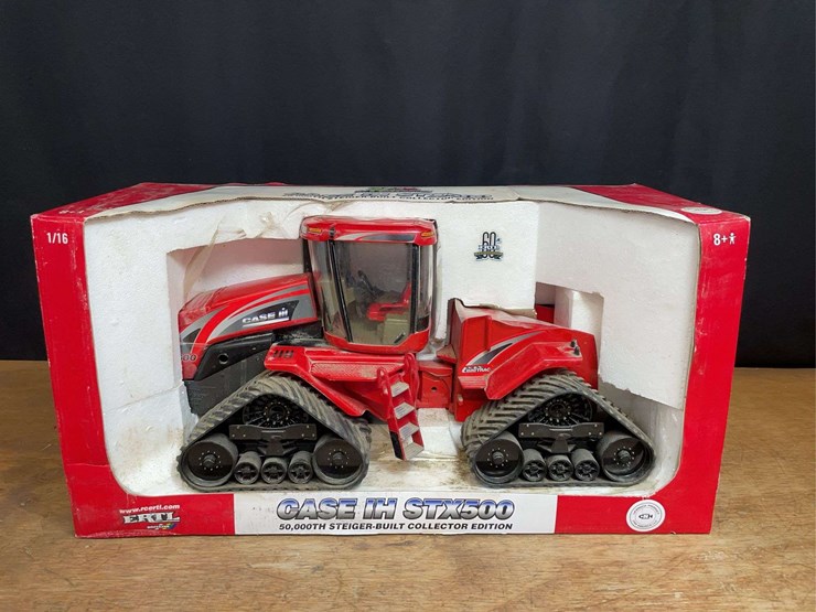 1/16-case-ih-stx500-collector-nib-ertl-image-1