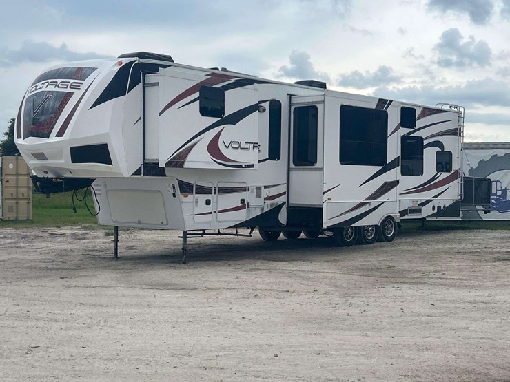 2012-dutchmen-voltage-v3950-42ft-5th-wheel-tri-axle-toy-hauler-travel-trailer-image-1