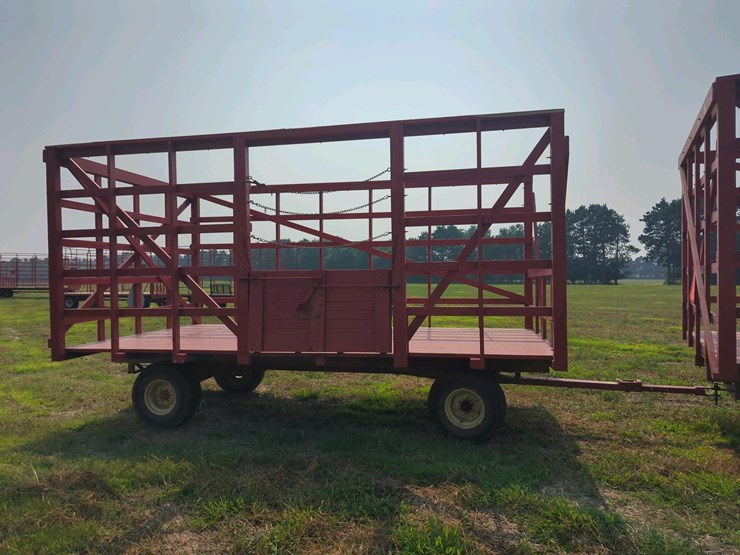 18-ft-wood-kicker-rack-with-gehl-10-ton-running-gear,-18'-long-x-8'10"-wide
(stored-inside)-image-1