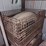 (3)-32"x40"x2'-wire-mesh-crates-with-assorted-farm-contents-including-tractor-tires,-small-front-tractor-tires,-weights,-seats-image-1