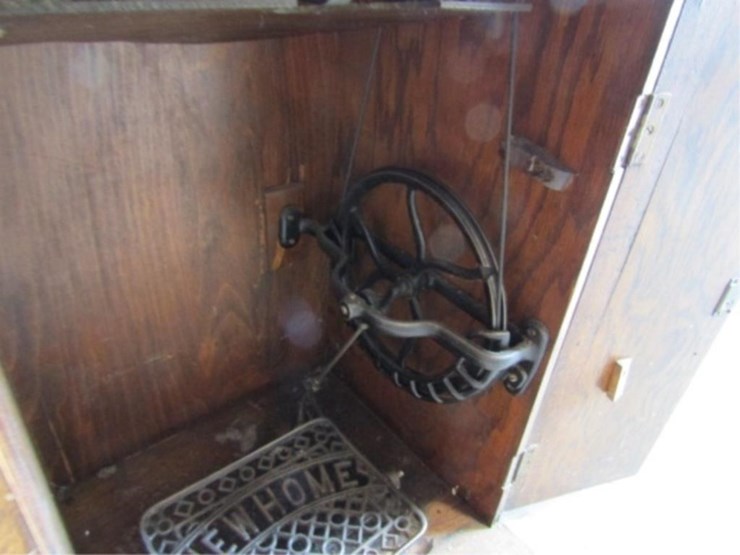 new-home-sewing-machine-w/attachments-&-cabinet-image-16