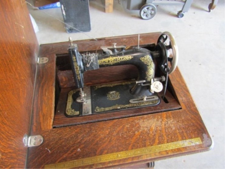 new-home-sewing-machine-w/attachments-&-cabinet-image-22