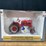 1/16-farmall-cub-w/disc-plow-2010-iowa-ffa-nib-sc-image-1