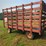 knowles-kicker-hay-rack,-16-ft-x-7-ft-x-8-ft,-5-6-ton-capacity,-wood-and-metal,-15-inch-tires.-image-3
