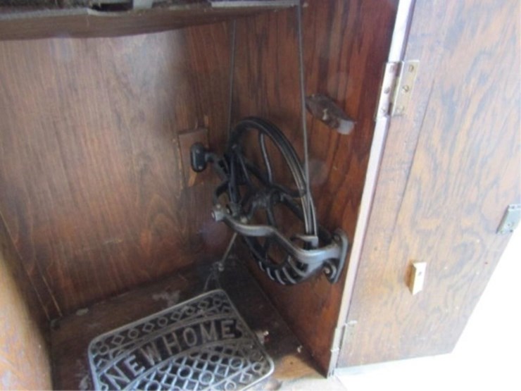 new-home-sewing-machine-w/attachments-&-cabinet-image-17