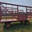 wooden-bale-kicker-rack-wagon-with-jumbo-10-ton-wagon
(stored-inside)-image-1