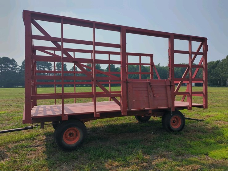 wooden-bale-kicker-rack-wagon-with-jumbo-10-ton-wagon
(stored-inside)-image-1