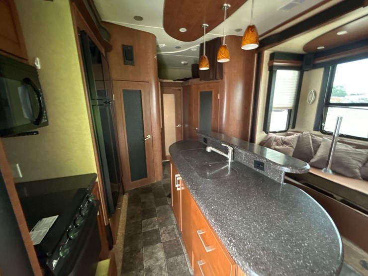 2012-dutchmen-voltage-v3950-42ft-5th-wheel-tri-axle-toy-hauler-travel-trailer-image-7