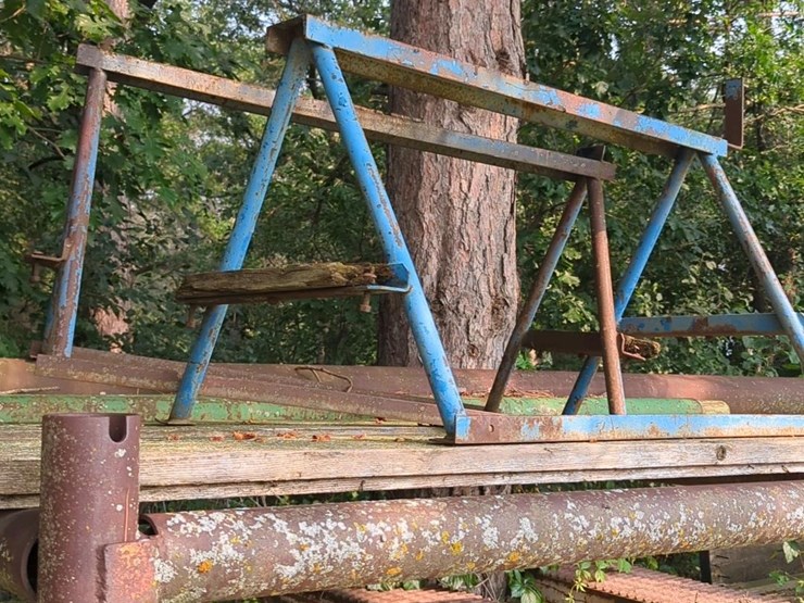 17'-x-6'-x-5'-outdoor-pipe-storage-rack-with-3-shelves,-with-assorted-lumber,-stakes,-and-large-26'-x-6"-pipe-(blue-metal-horses-not-included)-image-7
