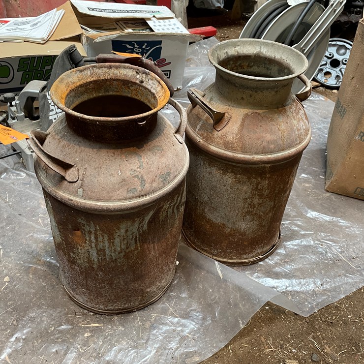 #7184 • (2) Metal Milk Cans