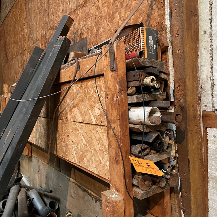 #7194 • Contents of Shelf Hanging on Wall