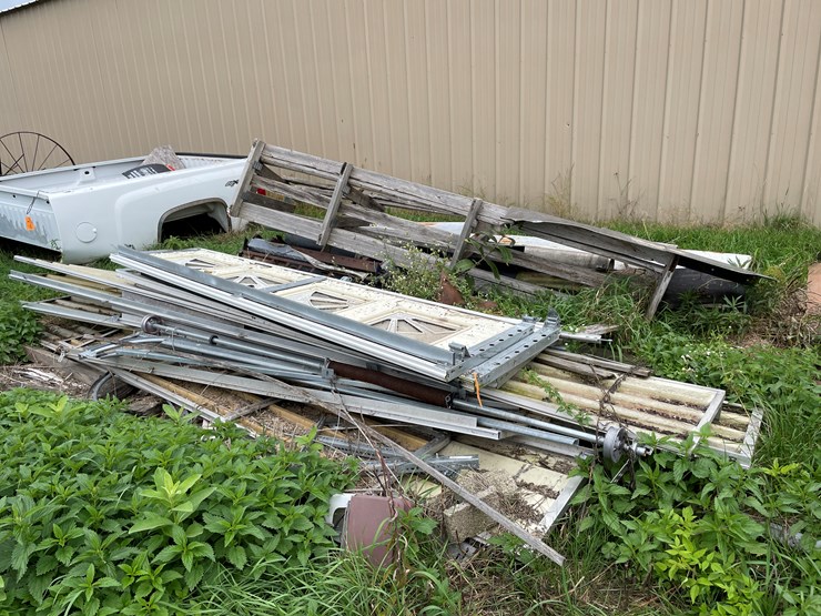 #7126-•-pile-of-used-garage-doors,-sheet-metal-and-more-image-1